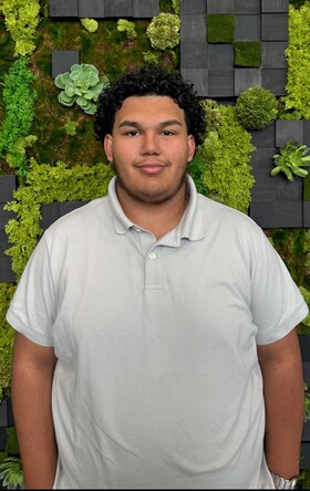 Staff member Elijah Lopez from 9f318b38ede9