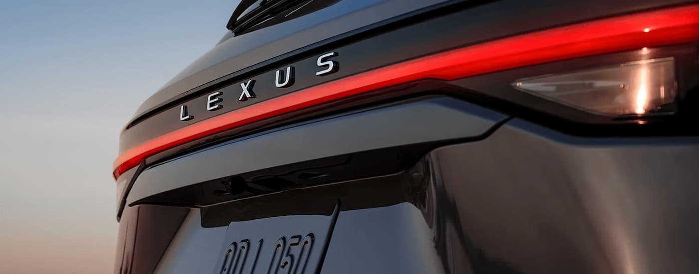 A close up of the brakelight on a black 2024 Lexus TX for sale in Long Island City.