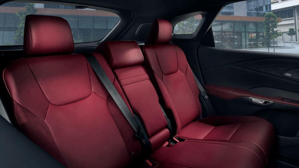The red and black interior in a 2024 Lexus RX is shown.