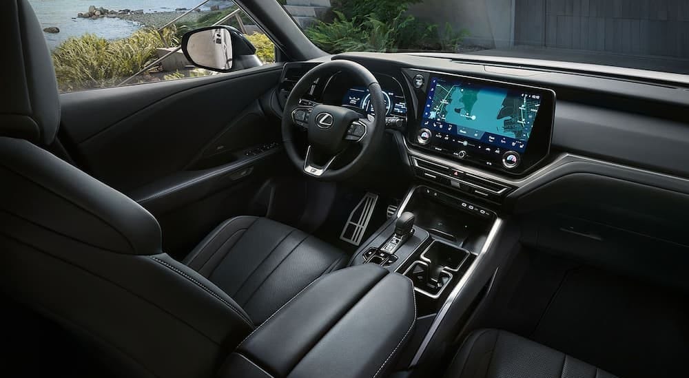The black interior and dash in a 2024 Lexus TX is shown.
