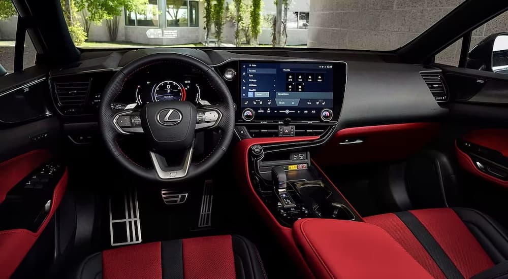 The red interior of a 2023 Lexus NX is shown.