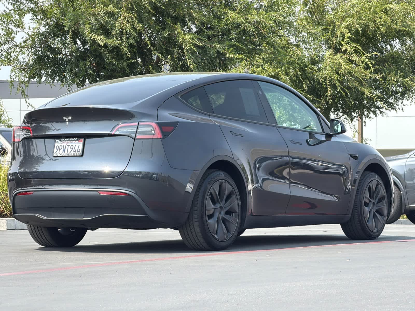 Used 2024 Tesla Model Y Long Range with VIN 7SAYGDED6RF210363 for sale in Sacramento, CA