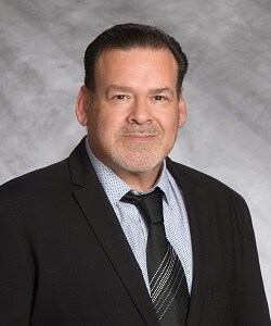 Staff member Gus Reynoso from ID_a3e5bb8c2b96