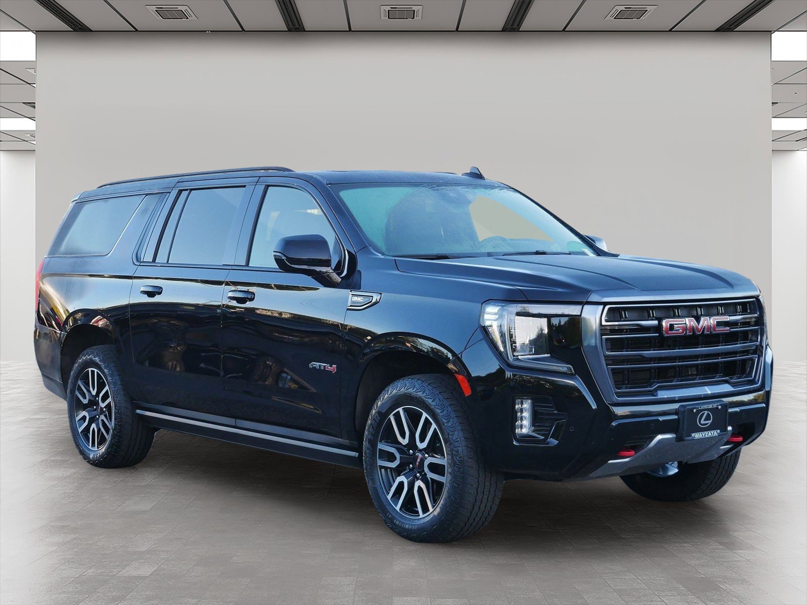 Used 2024 GMC Yukon XL AT4 with VIN 1GKS2HKDXRR116885 for sale in Wayzata, Minnesota