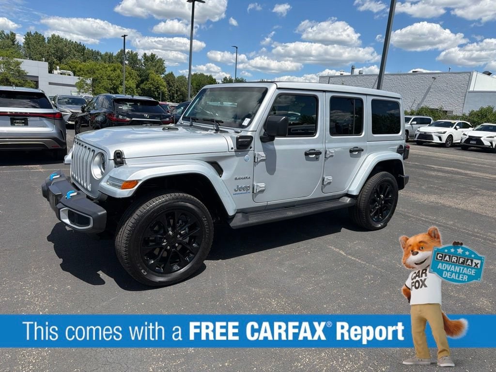 Used 2023 Jeep Wrangler 4xe Sahara 4XE with VIN 1C4JJXP67PW604205 for sale in Wayzata, Minnesota