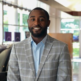 Staff member Dondre Clark from ID_998285