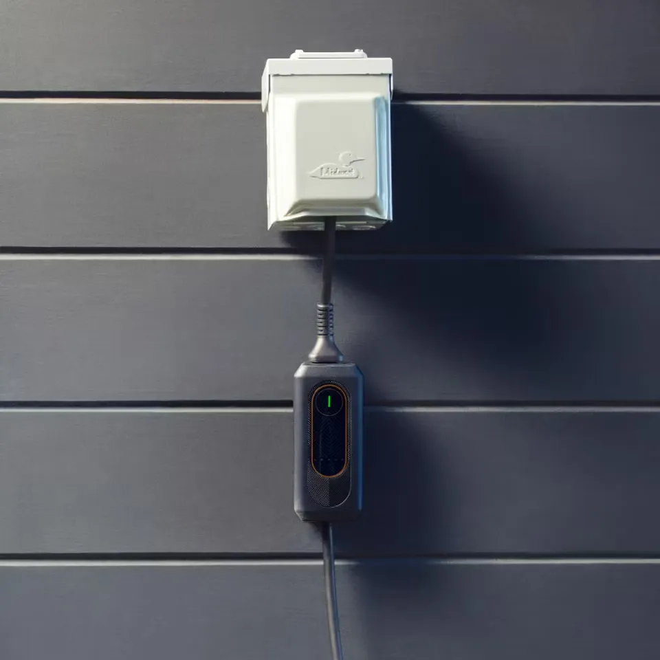  Lexus mobile charger hanging from outlet.