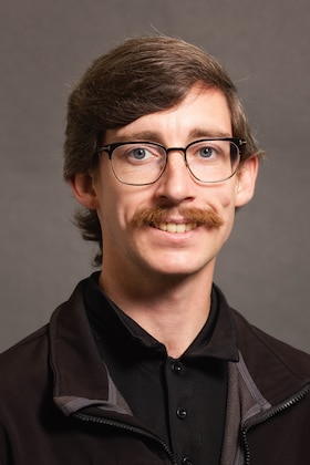 Staff member Kyler Schmidt from ID_9f17baec84c3