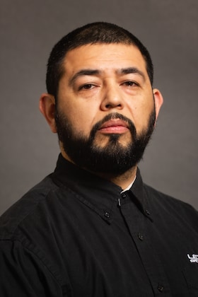 Staff member Cesar Servin from ID_949c228a9d33