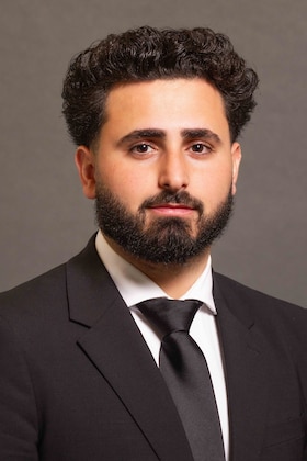 Staff member Allen Mikhael from ID_9648b6f6323b