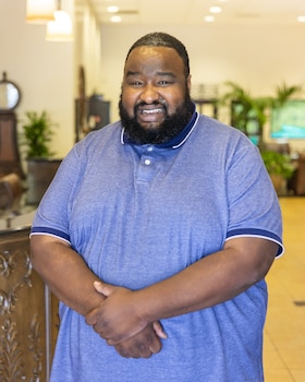 Staff member Alex Jean from 4c848f81f6ff