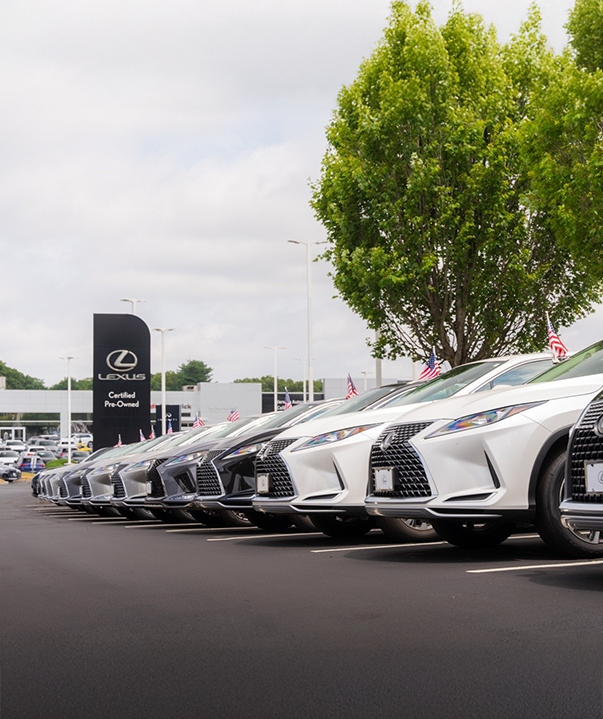 Lexus RX 450h+ Luxury AWD in Eminent White Pearl & a Lexus TX 500h F Sport Performance Luxury AWD in Cloudburst Gray