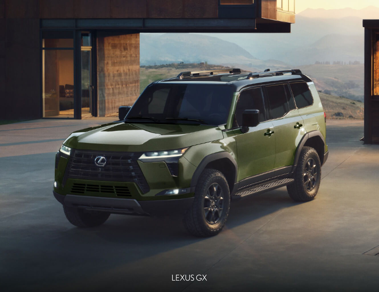 A front three-quarter view of a green Lexus GX parked in a modernist home's driveway.