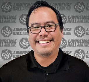 Staff member Reggie Regala from ID_1d53f7