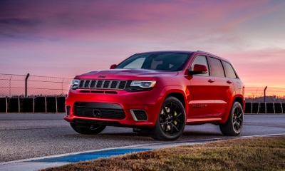 Jeep Grand Cherokee Trackhawk red Jeep Grand Cherokee Trackhawk driving outside