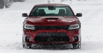 Dodge Charger driving in snow
