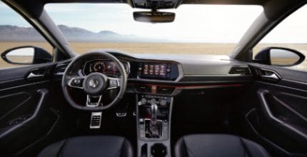 interior of a Jetta GLI showing dashboard including front and passenger seats