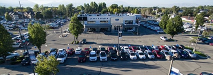 top down image of parking lot and dealership