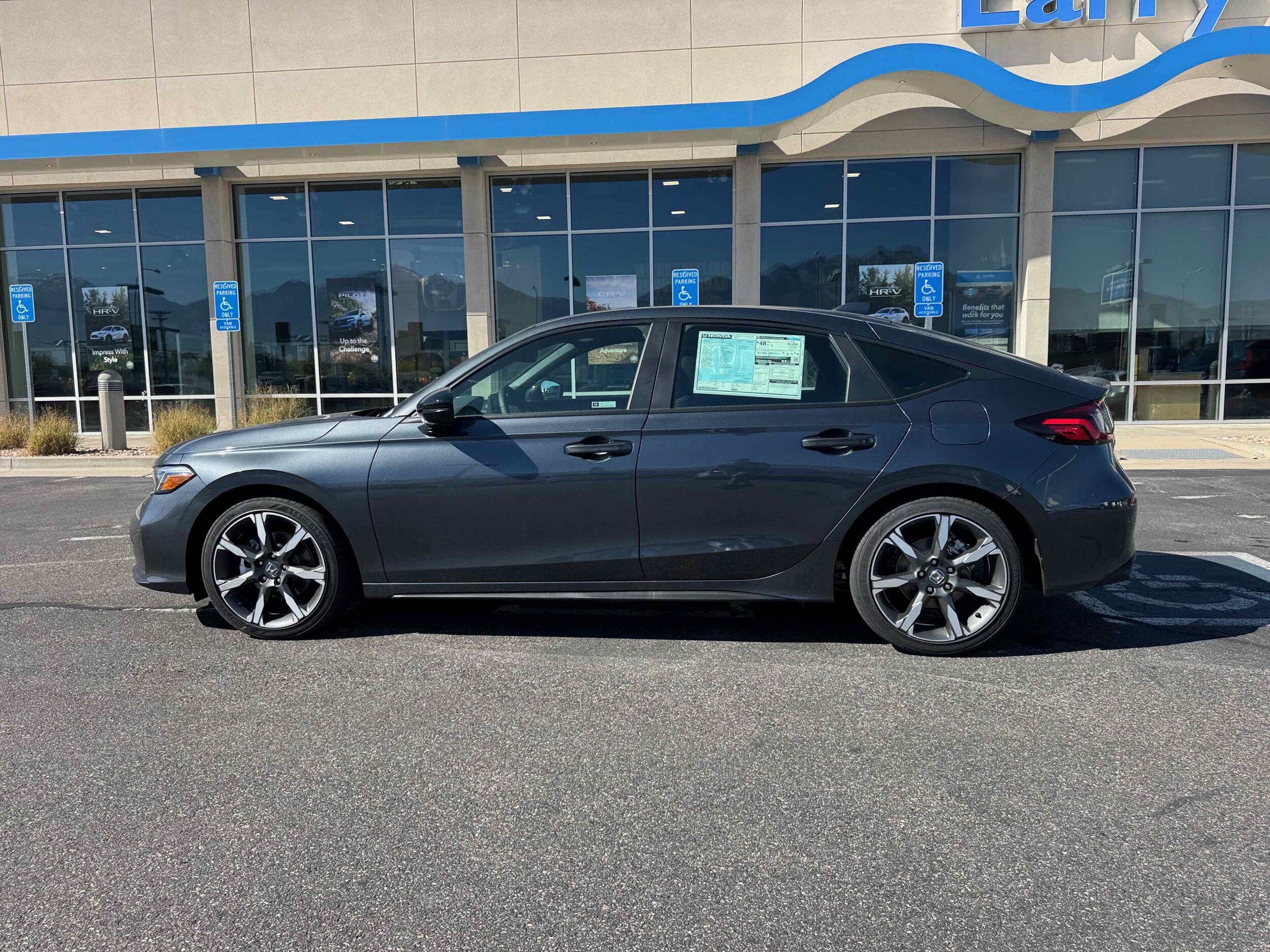 2026 Honda Civic Hybrid Sport Touring Hatchback photo 2