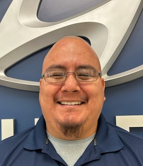 Staff member Andres Casas from ID_6a19ee04ed2c