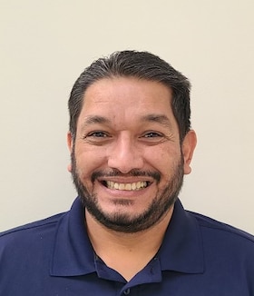 Staff member Eric Locke from ID_6a19ee04ed2c