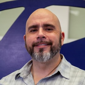 Staff member Josh Baca from ID_6a19ee04ed2c