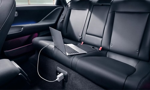 Hyundai IONIQ 6 interior rear seats view showing available 110v power outlet