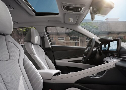 Interior front seat view of the 2021 Hyundai ELANTRA Hybrid Limited.