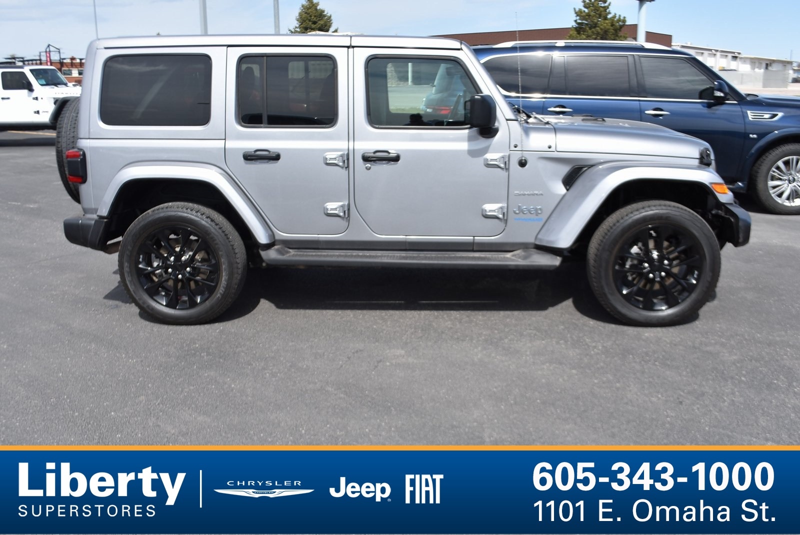 Used 2021 Jeep Wrangler Unlimited Sahara 4XE with VIN 1C4JJXP61MW643559 for sale in Rapid City, SD