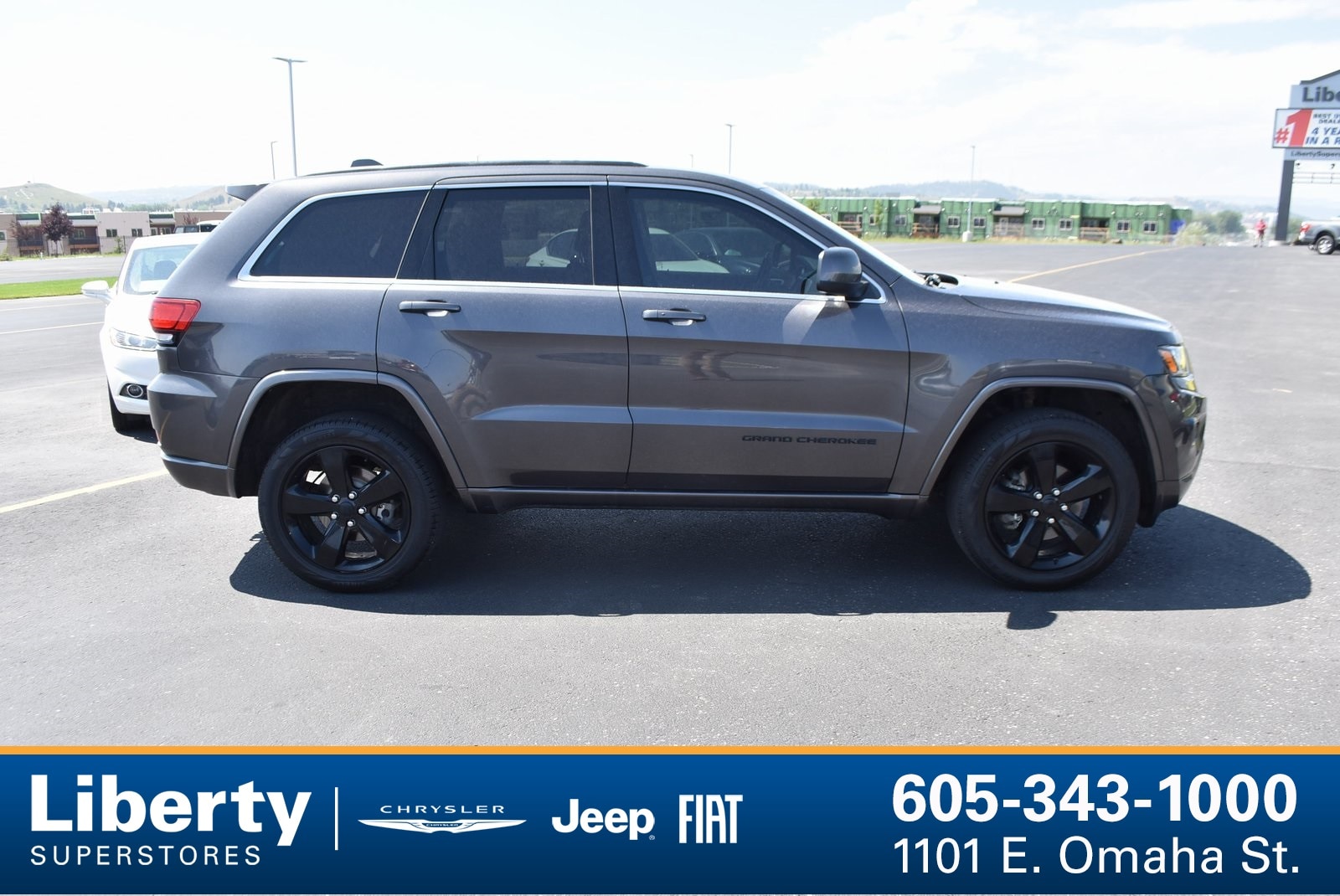 Used 2015 Jeep Grand Cherokee Altitude with VIN 1C4RJFAG4FC229596 for sale in Rapid City, SD