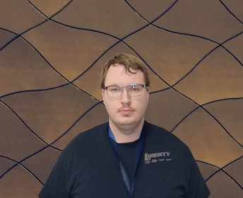 Staff member Travis Habick from 6864fd103b8f