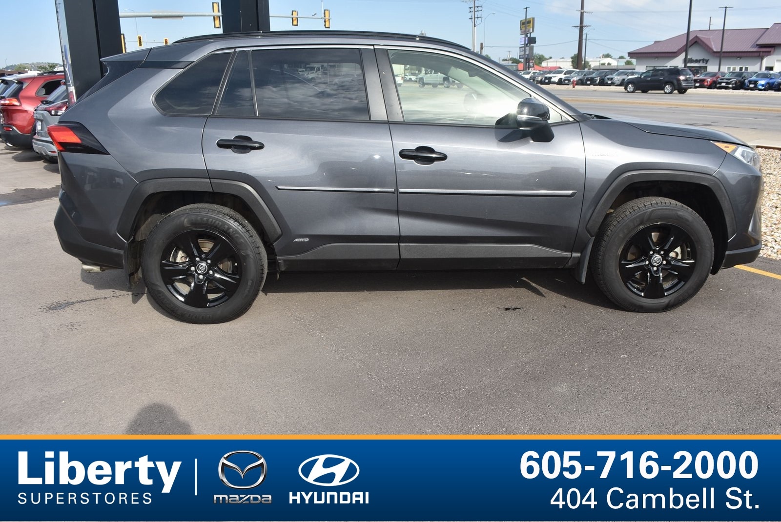 Used 2019 Toyota RAV4 XLE with VIN JTMRWRFV5KD011438 for sale in Rapid City, SD