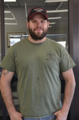 Staff member Monte Norman from 7a86aeadb929