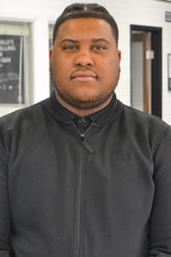 Staff member Damitrious Ervin from 7a86aeadb929