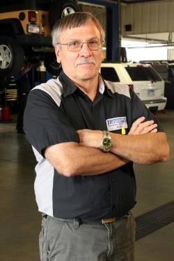 Staff member John Parkison from 7a86aeadb929