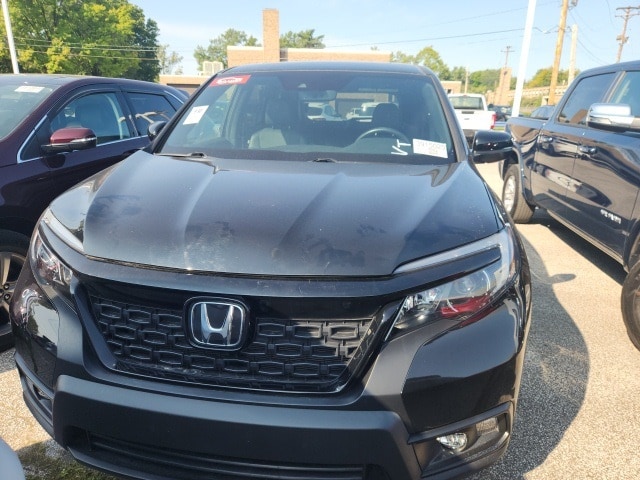 Used 2021 Honda Passport EX-L with VIN 5FNYF8H53MB006172 for sale in Parma, OH