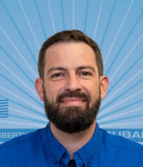 Staff member Garrett Eibert from 1b15351014a8