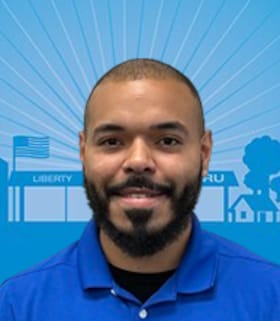 Staff member Joshua Monge from 1b15351014a8