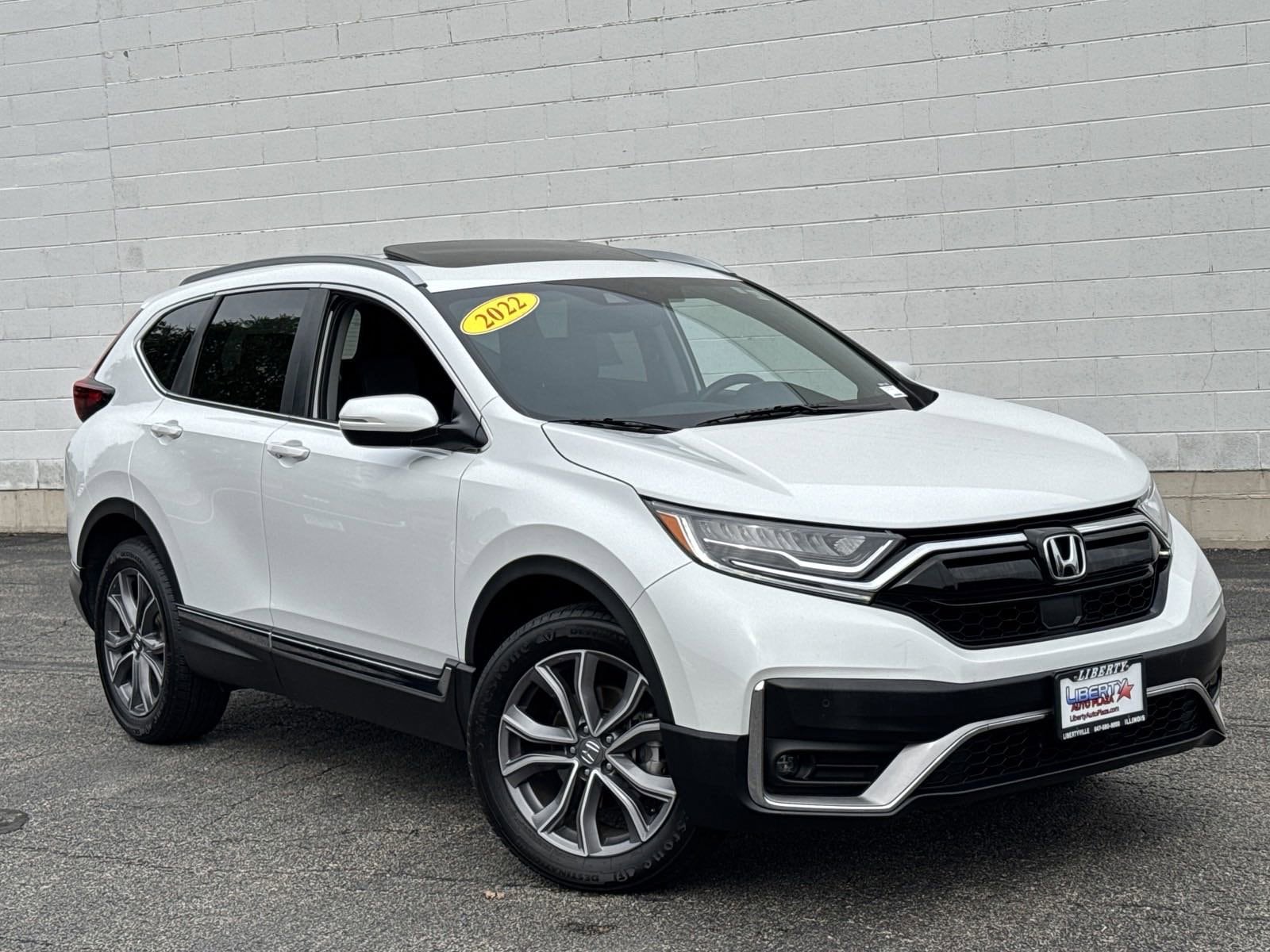 Used 2022 Honda CR-V Touring with VIN 2HKRW2H95NH642499 for sale in Libertyville, IL