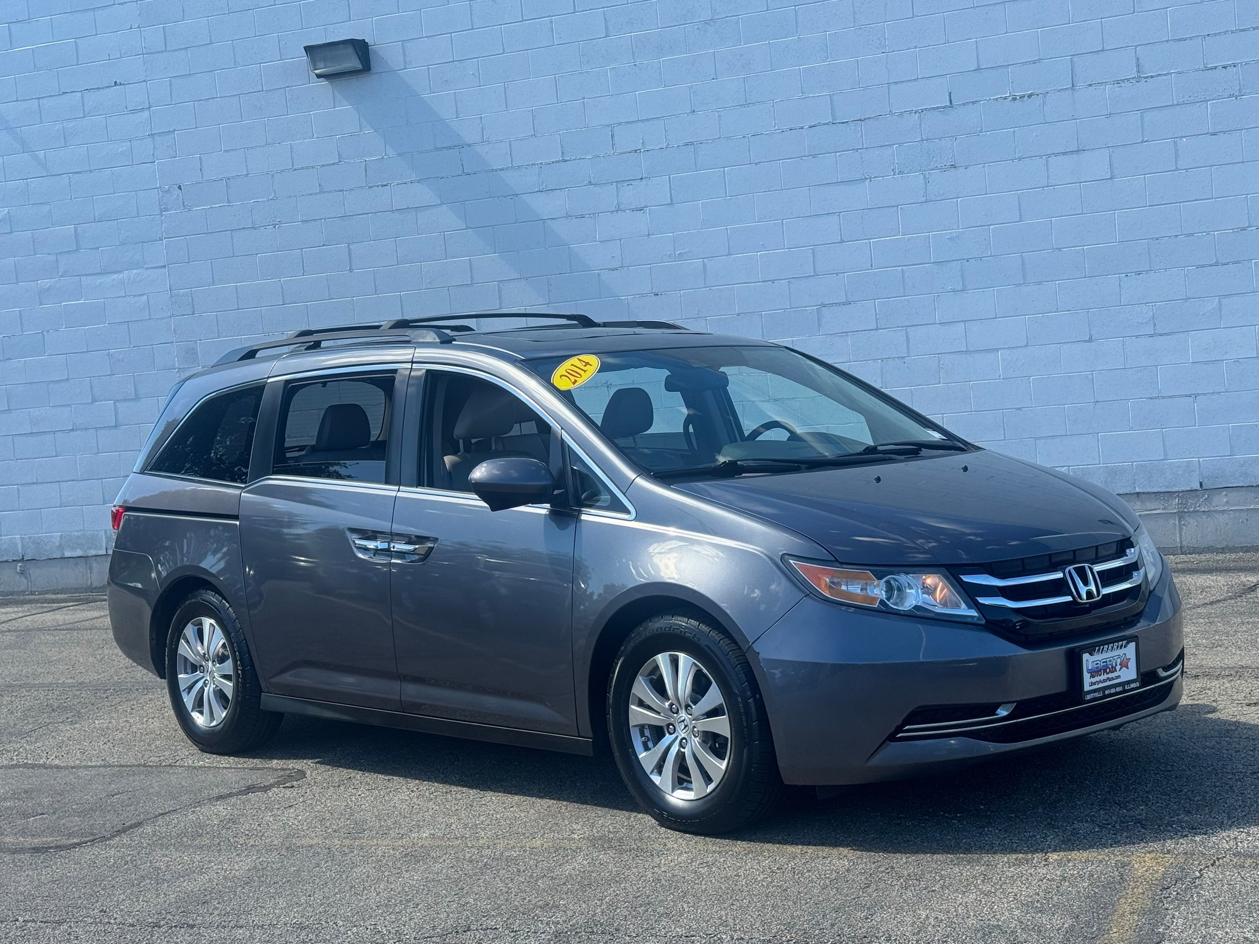 Used 2014 Honda Odyssey EX-L with VIN 5FNRL5H63EB082545 for sale in Libertyville, IL