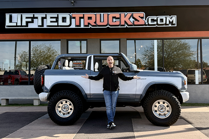  John Holmberg standing next to his custom Ford Bronco from Lifted Trucks