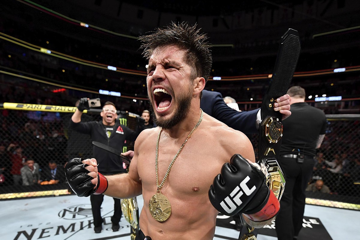  Kevin Costner leaning against his lifted Ford F-250 Diesel with a LifedTrucks.com decal viewable in the back window