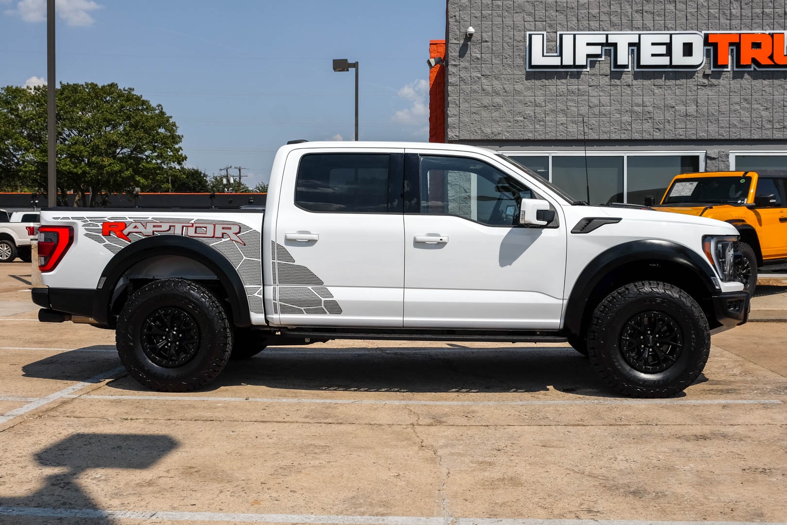 ford raptor lifted white
