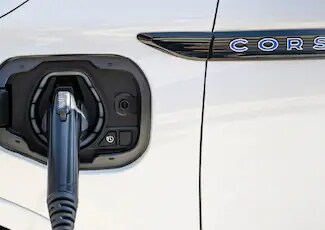 A charging cord is shown connected to a Lincoln Corsair® Grand Touring
