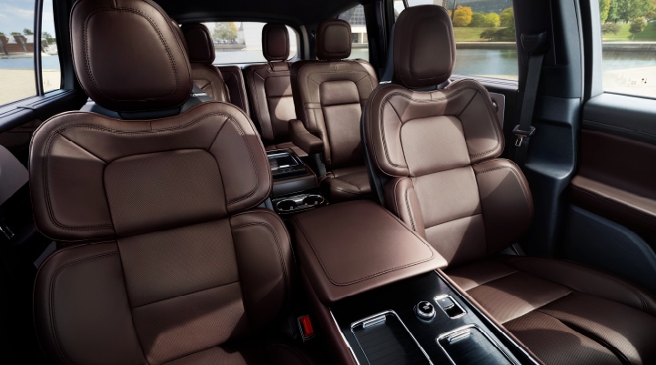 The cabin of the 2025 Lincoln AviatorĀ® SUV is shown with black and brown accents.
