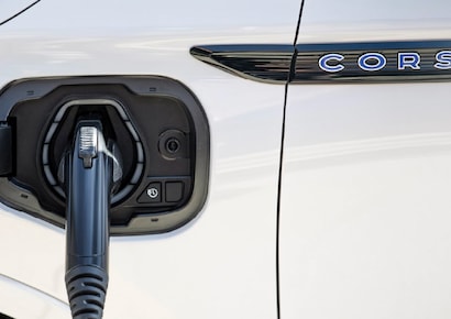 A charging cord is shown connected to a Lincoln Corsair® Grand Touring model.