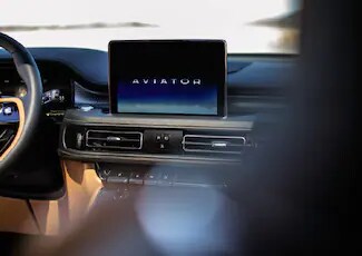 The center touchscreen of a Lincoln Aviator® is shown
