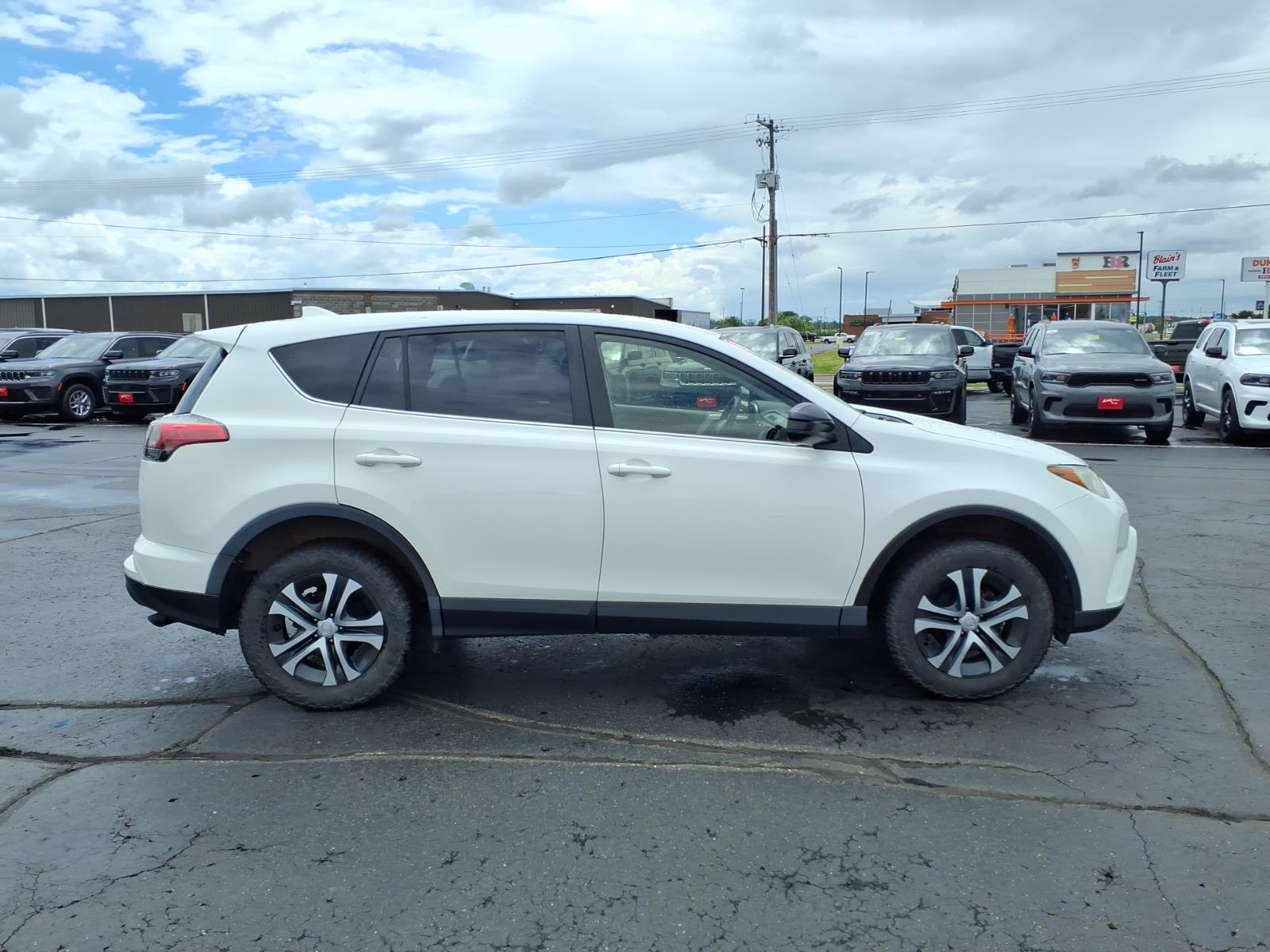 Used 2018 Toyota RAV4 LE with VIN JTMBFREVXJJ228115 for sale in Rice Lake, WI