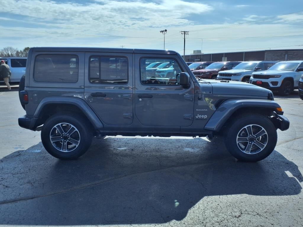 Used 2023 Jeep Wrangler 4-Door Sahara with VIN 1C4HJXEN7PW587074 for sale in Rice Lake, WI