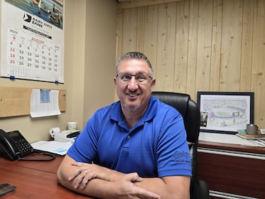 Staff member John Sedlak from 6e081422b882